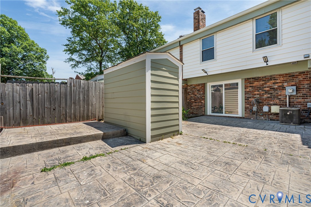 10050 Purcell Road Richmond, VA 23228 - Photo 26 of 26 a front view of a house with a yard