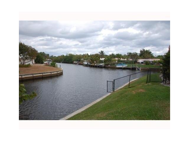 1290 Cypress Way Boca Raton, FL 33486 - Photo 14 of 15 a black and white photo of a lake