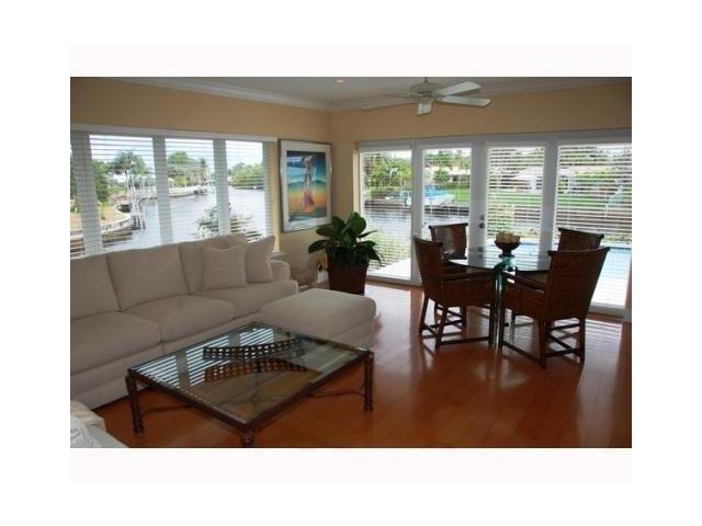 1290 Cypress Way Boca Raton, FL 33486 - Photo 8 of 15 a living room with furniture and large windows