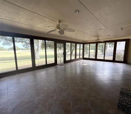 a kitchen with sink cabinets and refrigerator