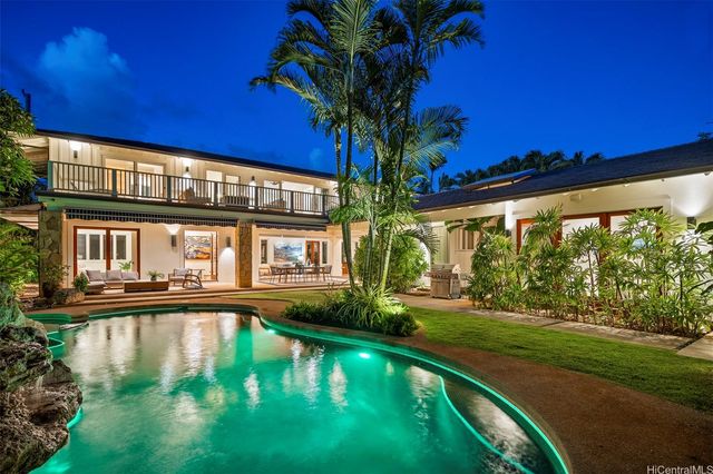 a view of a house with a swimming pool