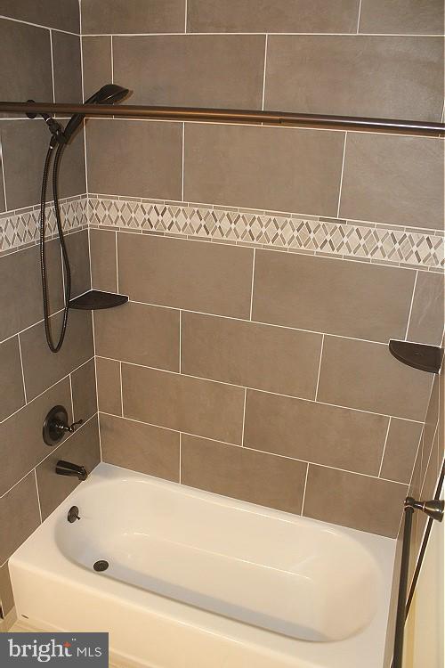 1603 Squirrel Road Marlton, NJ 08053 - Photo 19 of 29 a bathroom with a bath tub