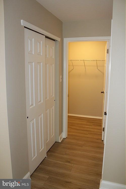 1603 Squirrel Road Marlton, NJ 08053 - Photo 22 of 29 an empty room with wooden floor and windows