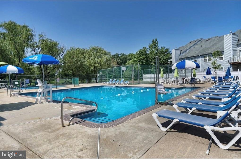 1603 Squirrel Road Marlton, NJ 08053 - Photo 26 of 29 a view of a patio with swimming pool table and chairs