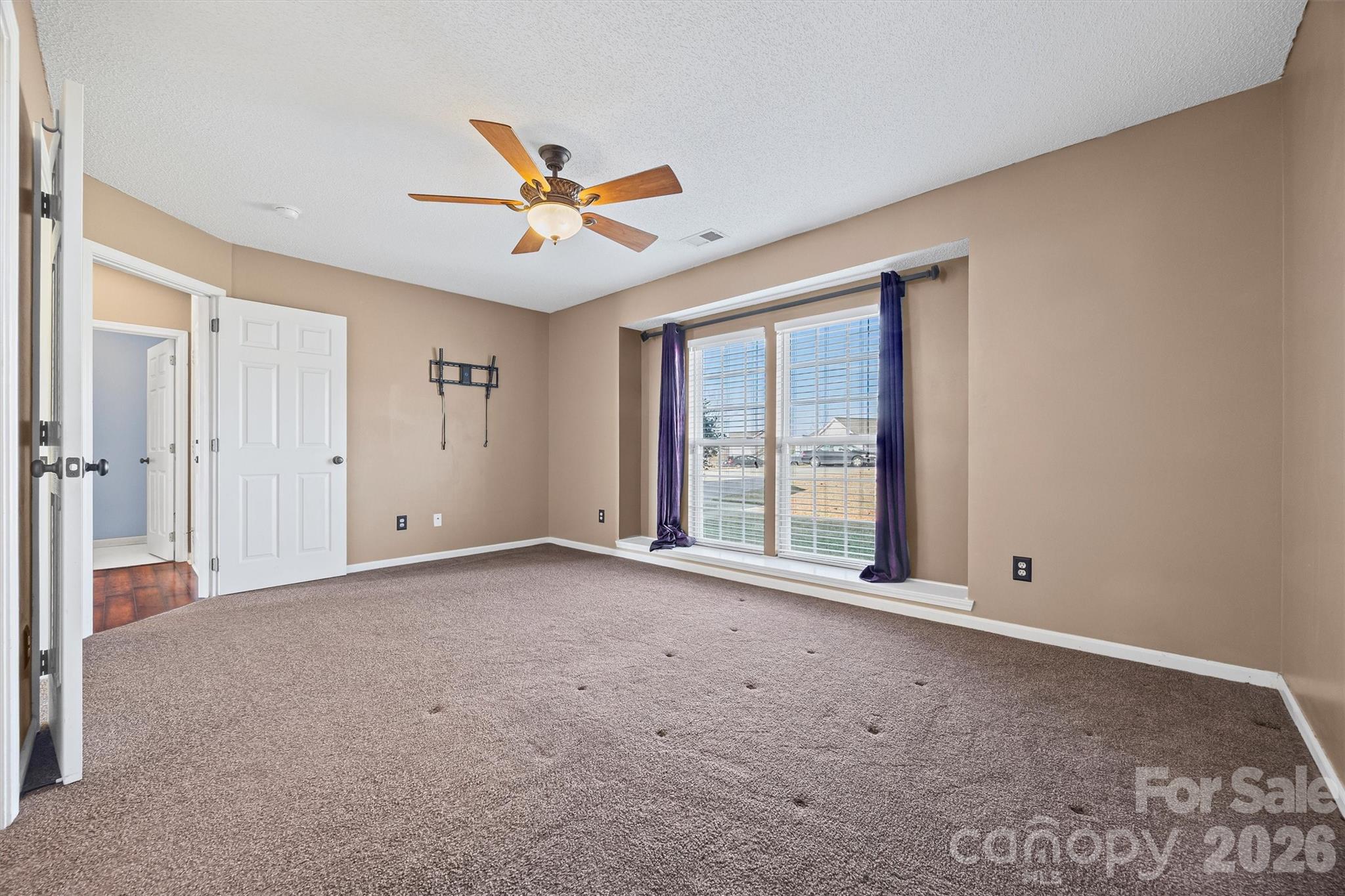 132 Sella Ridge Drive Mount Holly, NC 28120 - Photo 16 of 28 a view of an empty room with a window