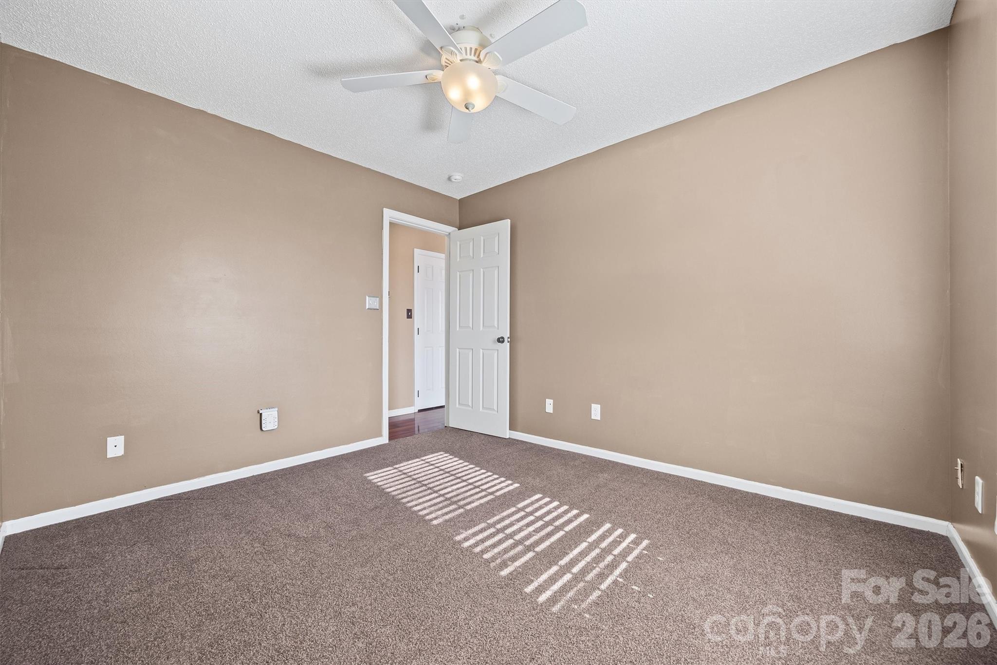 132 Sella Ridge Drive Mount Holly, NC 28120 - Photo 19 of 28 a view of an empty room with a window