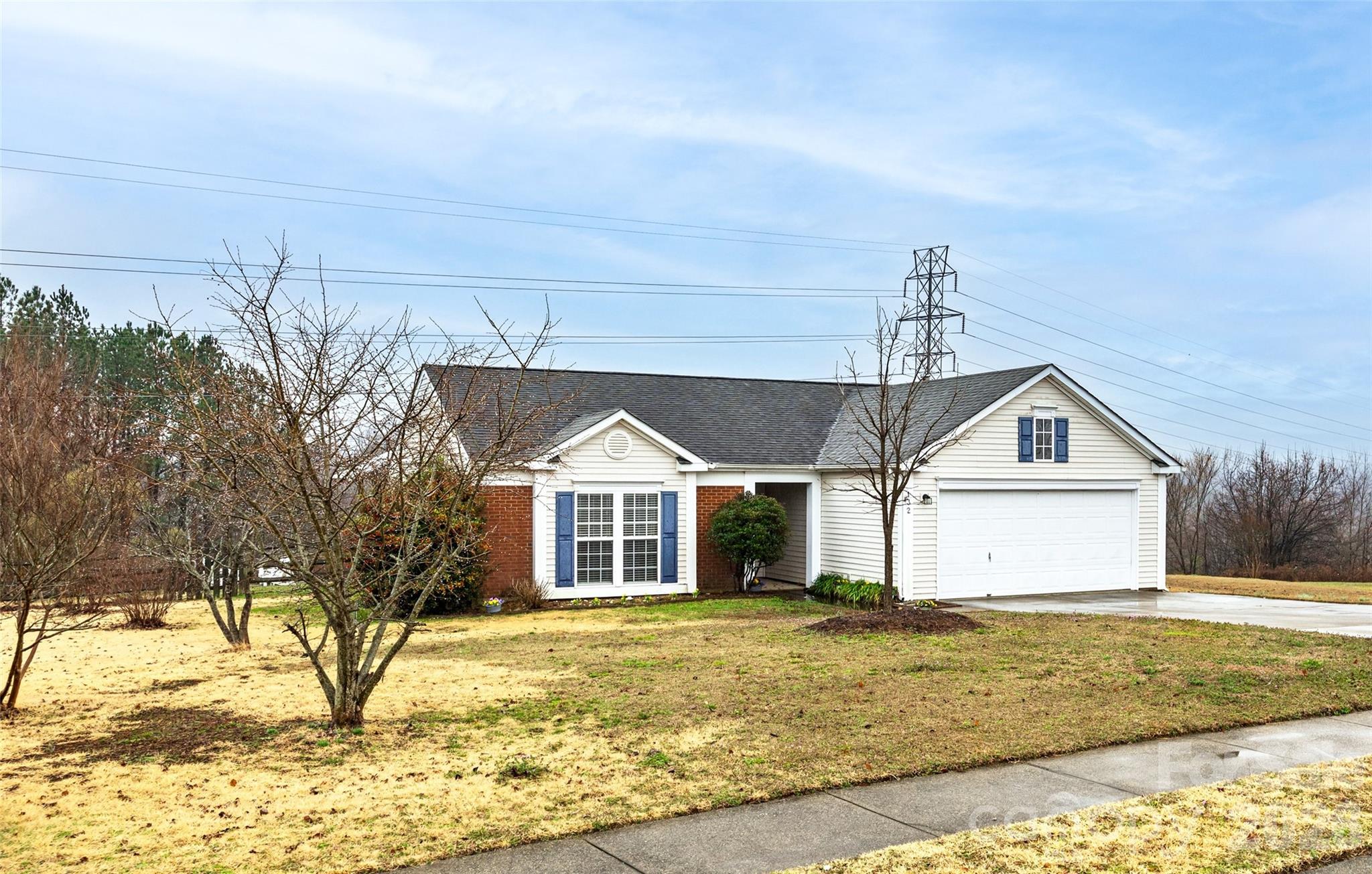 132 Sella Ridge Drive Mount Holly, NC 28120 - Photo 3 of 28 a house view with a outdoor space