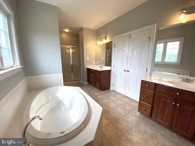 320 Kennard Road Perkasie, PA 18944 - Photo 15 of 29 a spacious bathroom with a tub sink and mirror