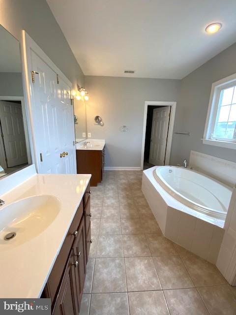 320 Kennard Road Perkasie, PA 18944 - Photo 16 of 29 a spacious bathroom with a tub sink and mirror
