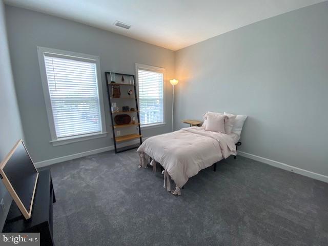 320 Kennard Road Perkasie, PA 18944 - Photo 18 of 29 a bed sitting in a room next to a window