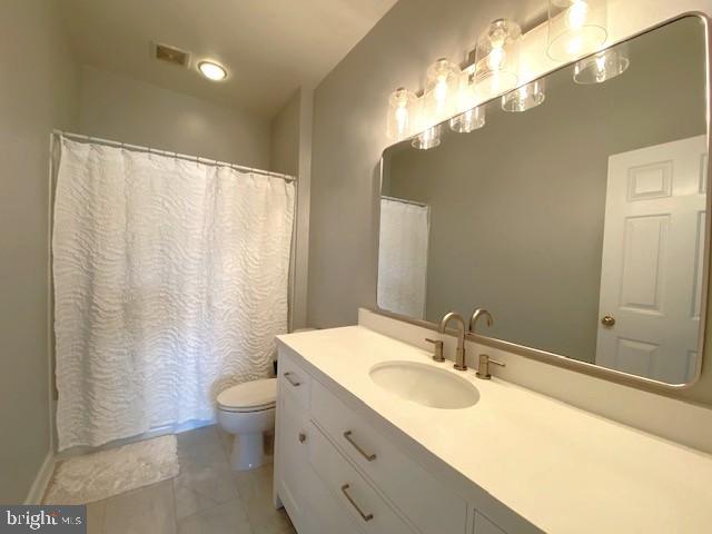 320 Kennard Road Perkasie, PA 18944 - Photo 19 of 29 a bathroom with a double vanity sink mirror and toilet