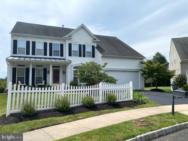 320 Kennard Road Perkasie, PA 18944 - Photo 29 of 29 a front view of a house with a garden and deck