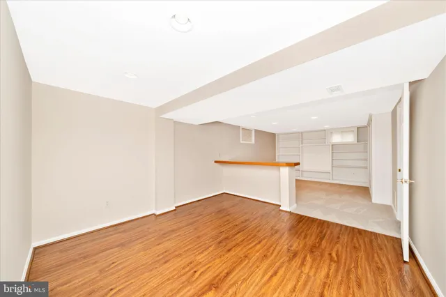 a view of a kitchen with a sink and dishwasher