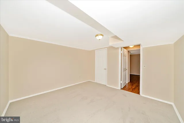 a view of a two chairs on the roof deck