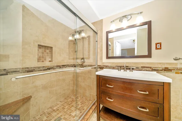a view of backyard with wooden floor and large trees