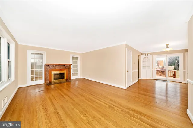 a view of a livingroom with wooden floor