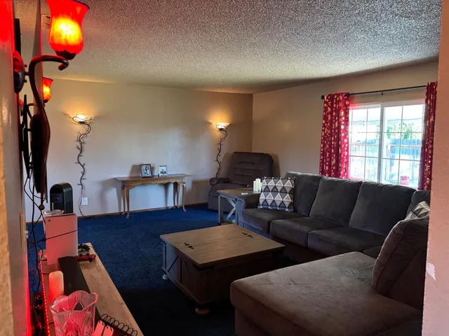 a bathroom with a bathtub and a window