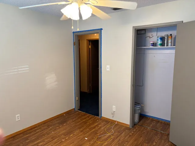 a view of parking garage with cars