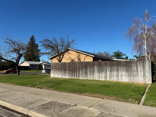a view of swimming pool with a backyard