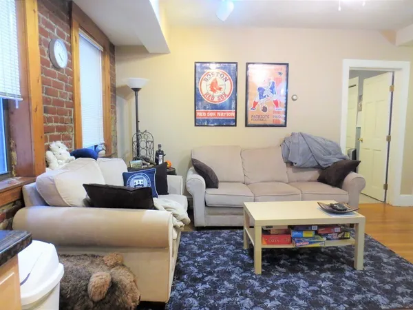 a living room with furniture and a couch