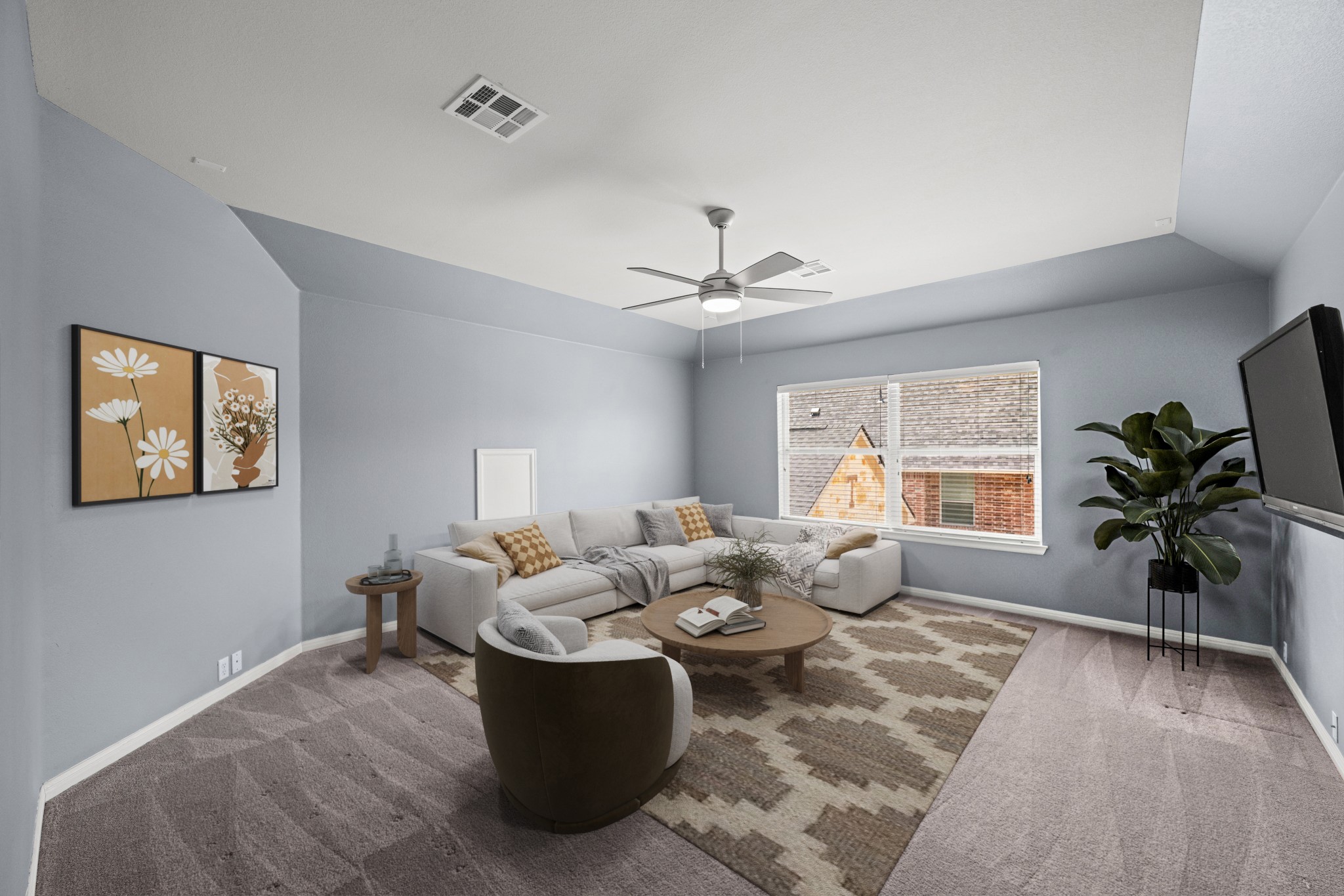1023 Grassy Field Road Austin, TX 78737 - Photo 25 of 40 Spacious 5th bedroom featuring vaulted ceilings, a large window, a ceiling fan with integrated lighting. Virtually staged to show flexibility with large space.