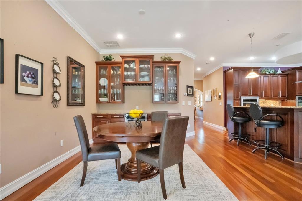 5785 Gilliam Road Orlando, FL 32818 - Photo 27 of 100 a view of a dining room with furniture