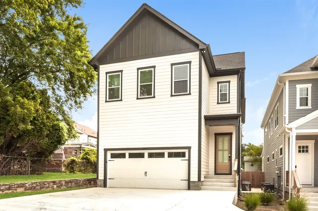 a view of a house with a street