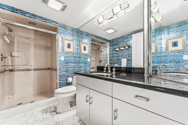 a view of storage and utility room with washer and dryer