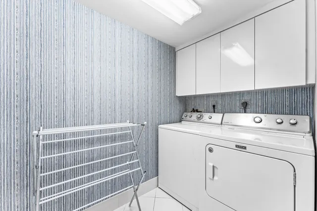 a swimming pool with outdoor seating and yard