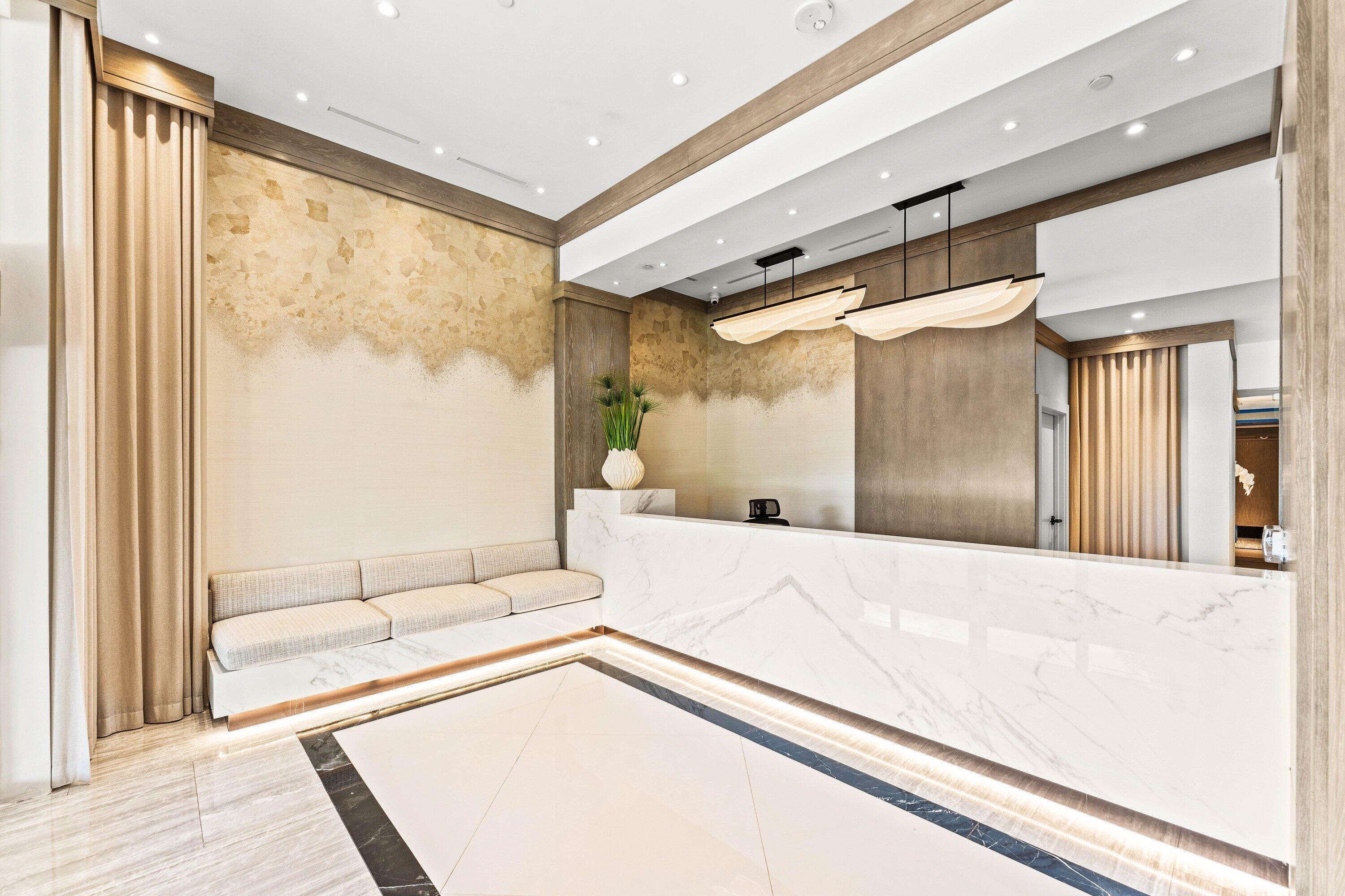 3170 South Ocean Boulevard, Unit S302 Palm Beach, FL 33480 - Photo 22 of 34 a view of a hallway with a large window