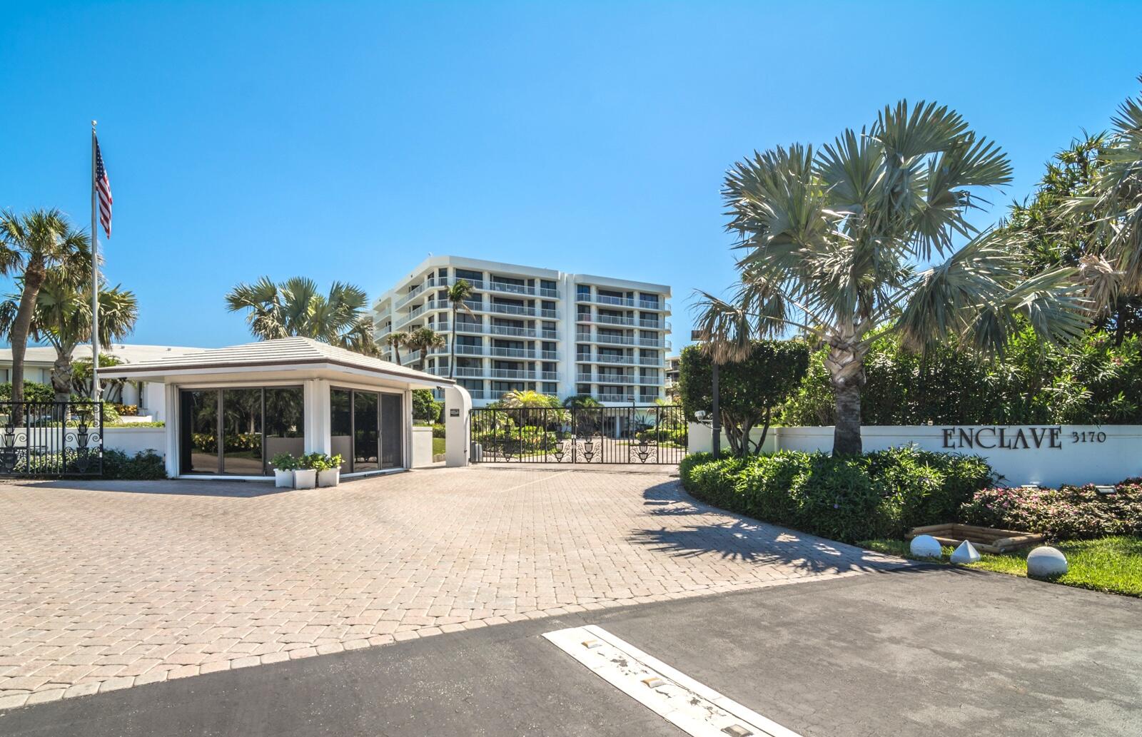 3170 South Ocean Boulevard, Unit S302 Palm Beach, FL 33480 - Photo 27 of 34 a view of the house with potted plants and palm trees