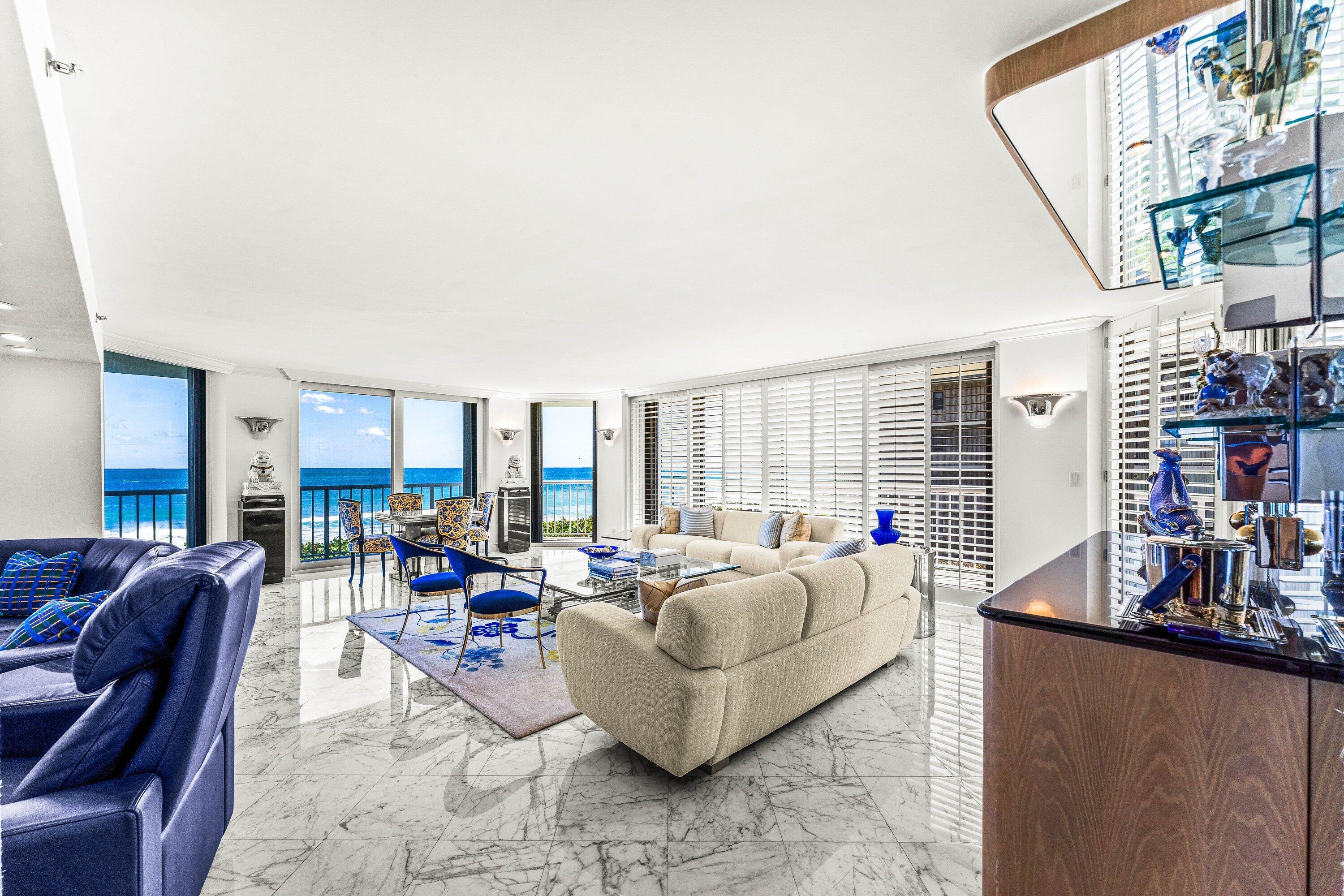 3170 South Ocean Boulevard, Unit S302 Palm Beach, FL 33480 - Photo 5 of 34 a living room with furniture and a large window