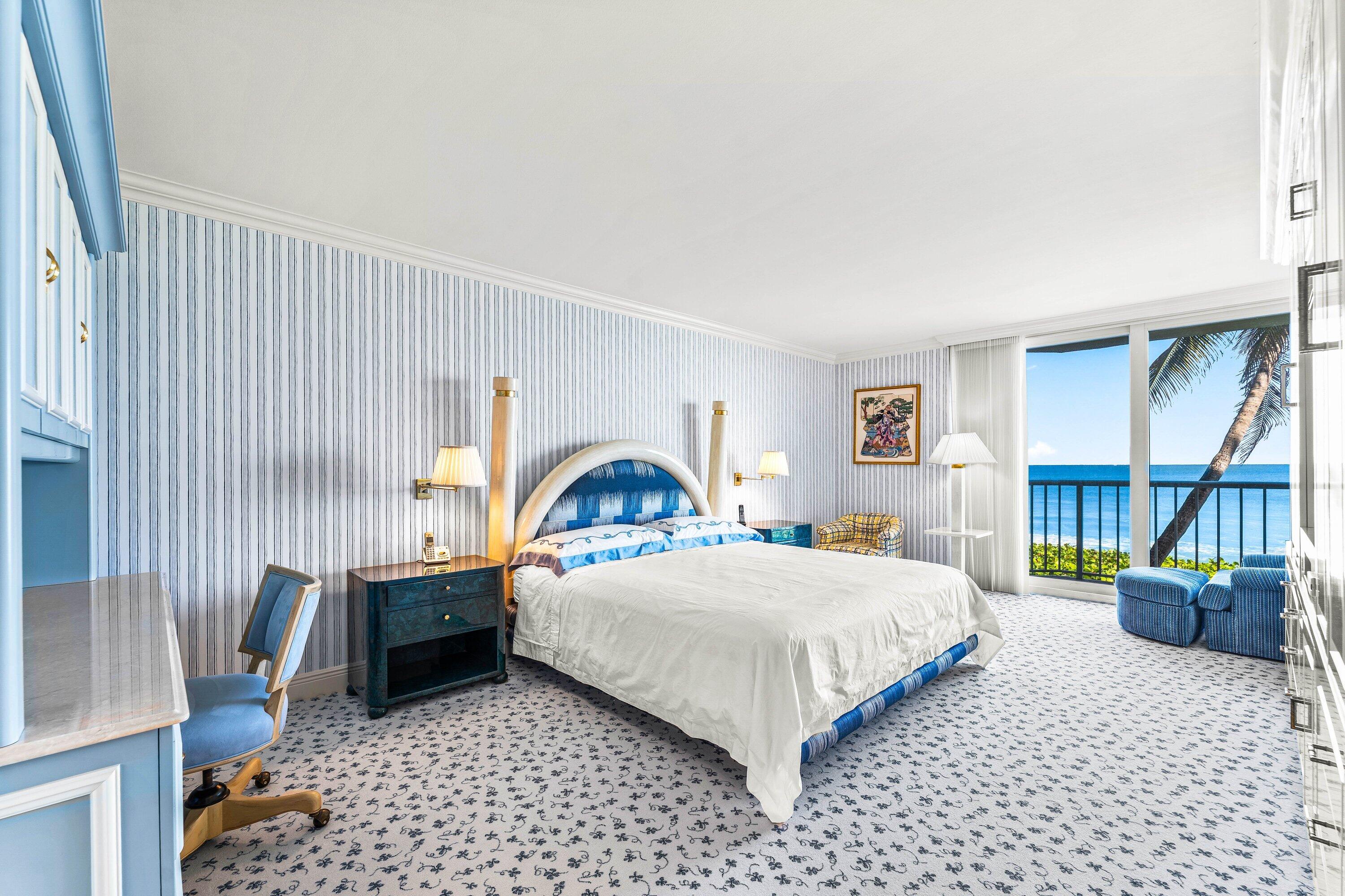 3170 South Ocean Boulevard, Unit S302 Palm Beach, FL 33480 - Photo 9 of 34 a bedroom with a bed and a large window