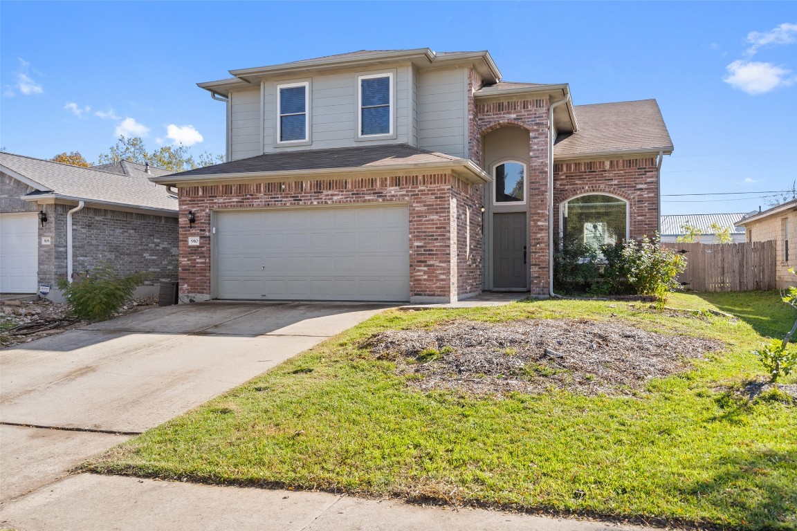 910 Cedar Crest Drive Cedar Park, TX 78613 - Photo 1 of 1 a front view of a house with a yard