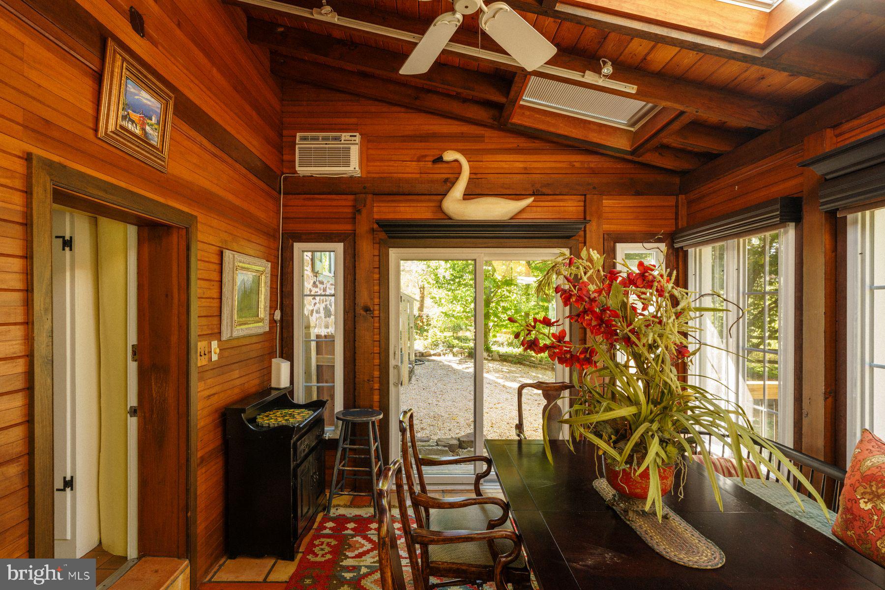 2943 Windy Bush Road Newtown, PA 18940 - Photo 20 of 49 a view of a porch with furniture and floor to ceiling window