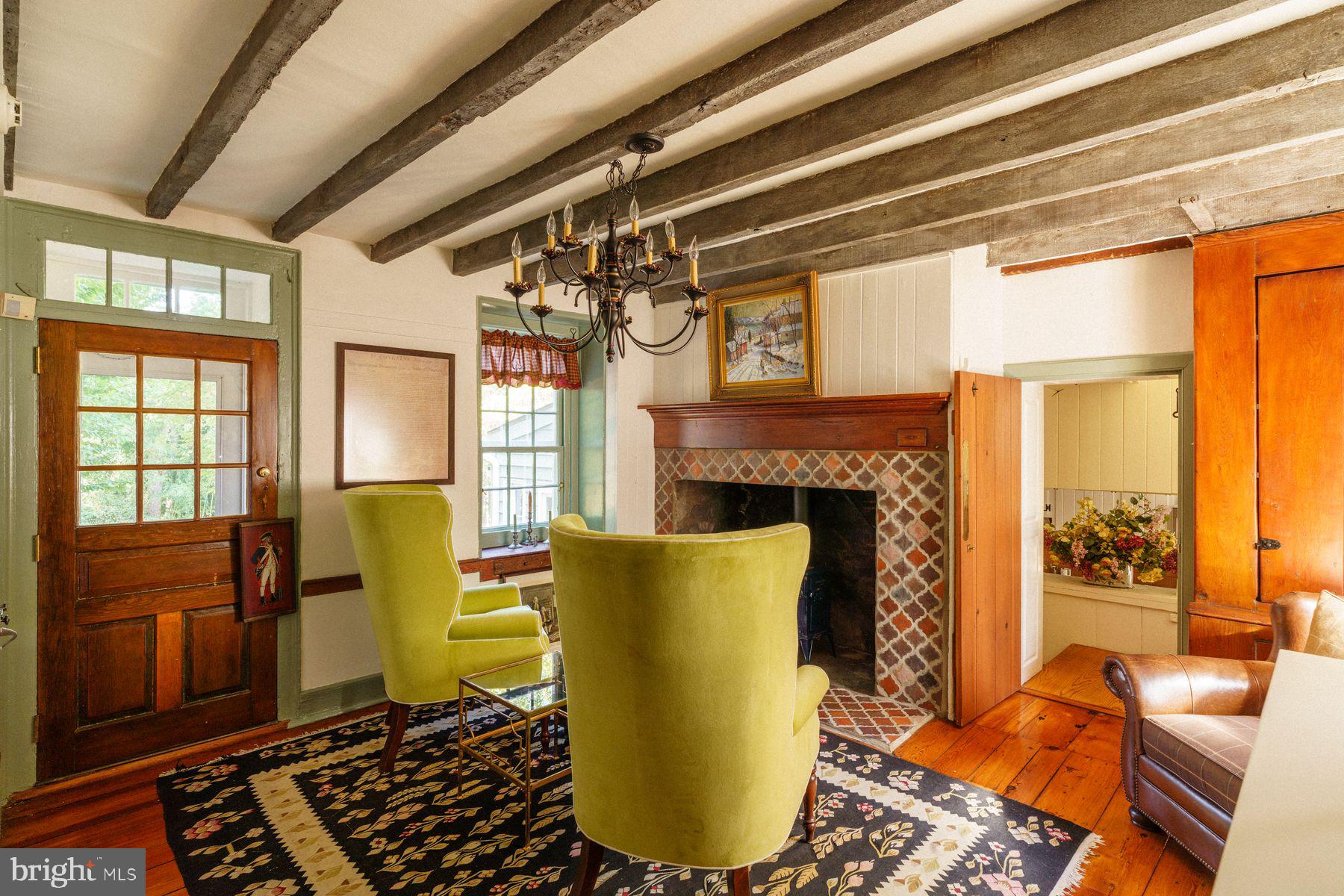 2943 Windy Bush Road Newtown, PA 18940 - Photo 4 of 49 a living room with furniture and a fireplace