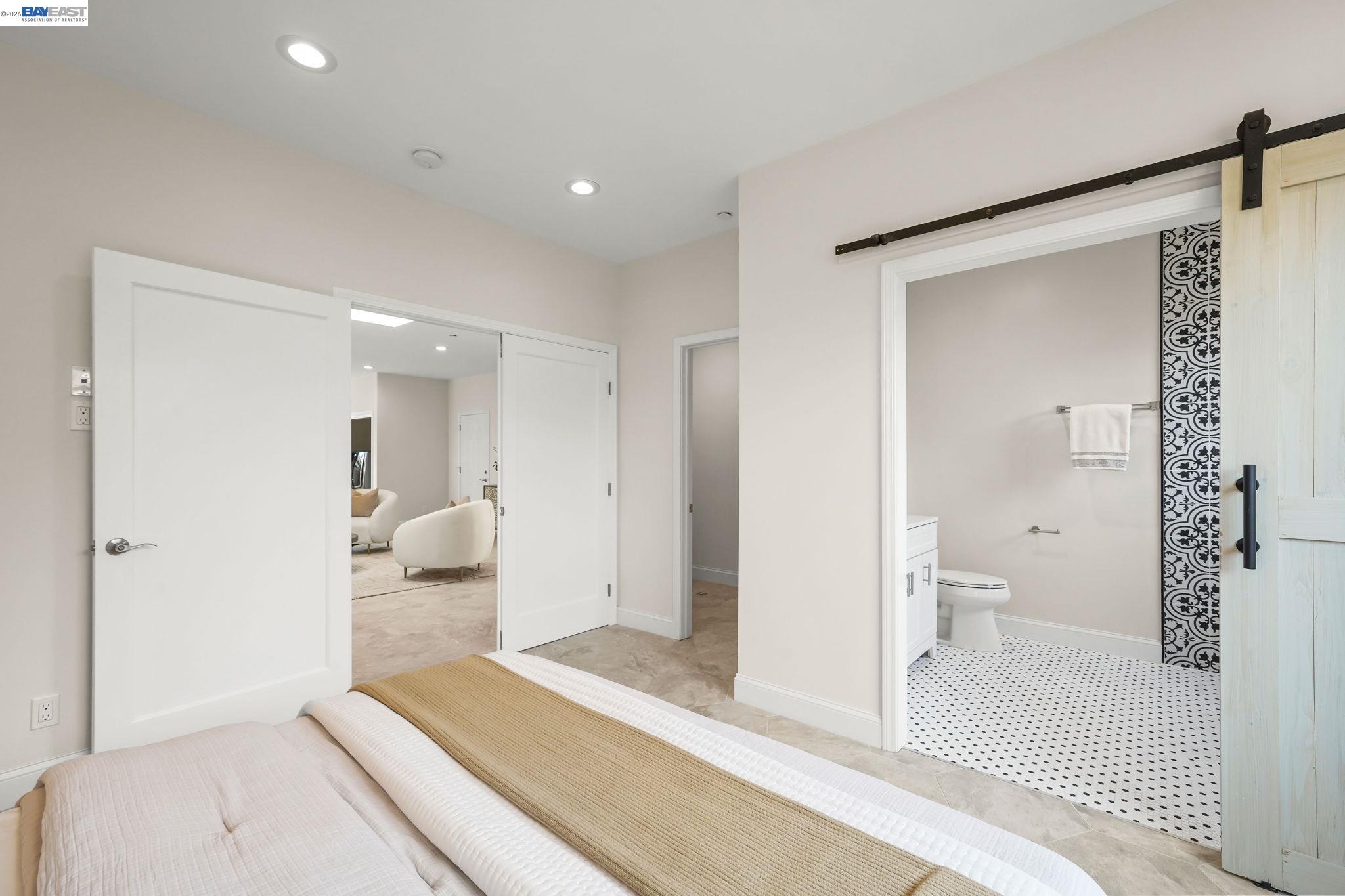 40772 Blacow Road Fremont, CA 94538 - Photo 24 of 40 a bathroom with a sink and a large mirror