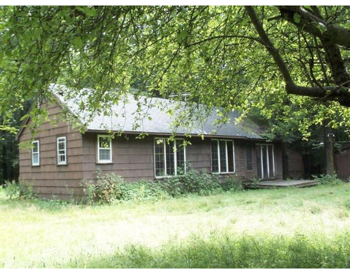 0 Swamp Road Heath, MA 01346 - Photo 1 of 1 a house that has a tree in front of it