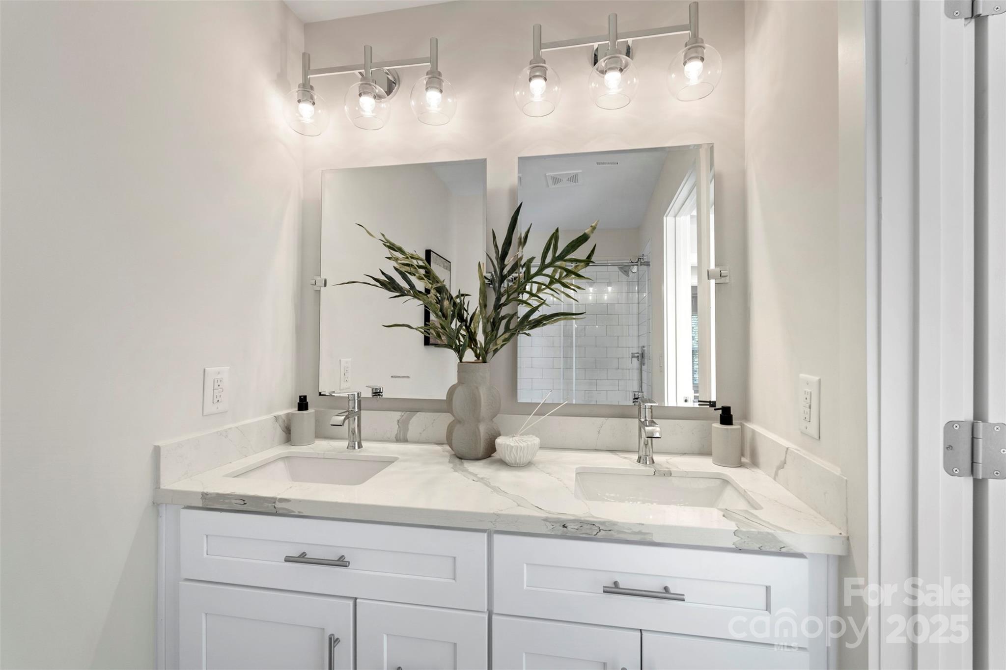 1116 Wonder Way Charlotte, NC 28208 - Photo 27 of 35 a bathroom with a sink and a mirror