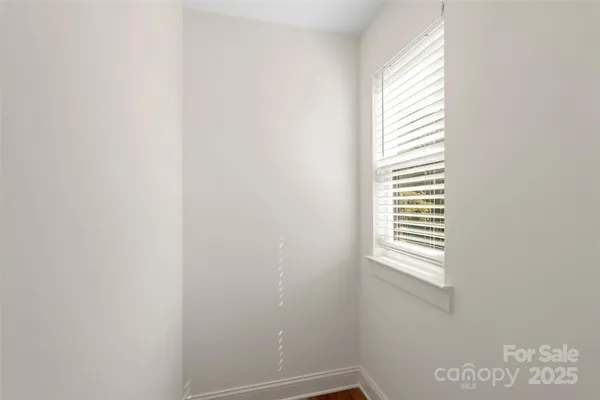 a view of a window in an empty room