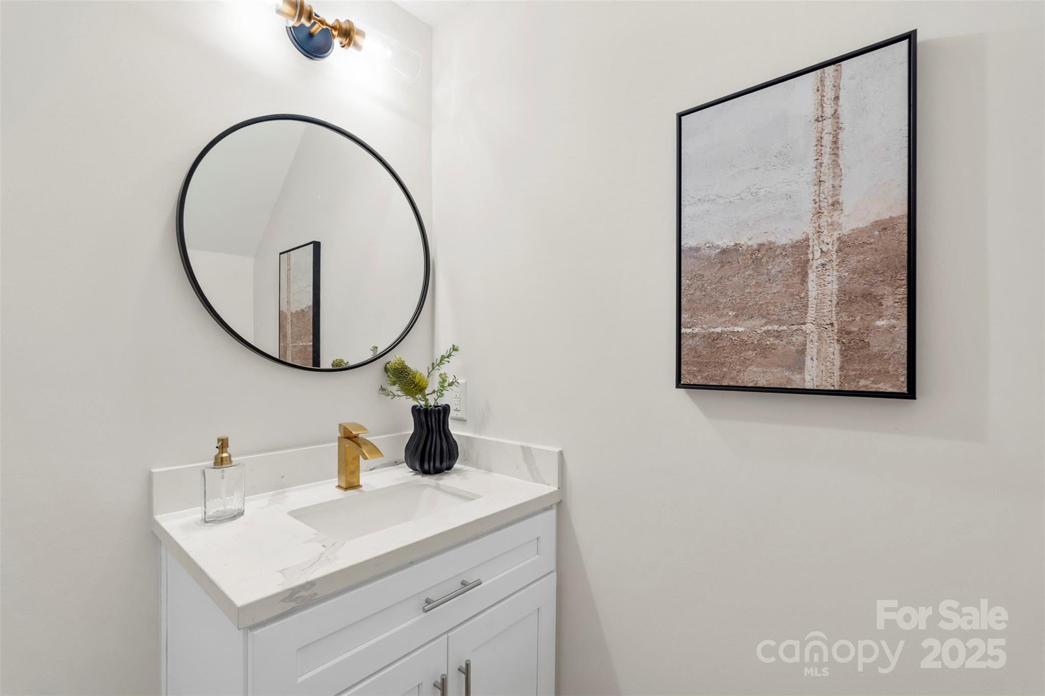 1116 Wonder Way Charlotte, NC 28208 - Photo 9 of 35 a bathroom with a sink and a mirror