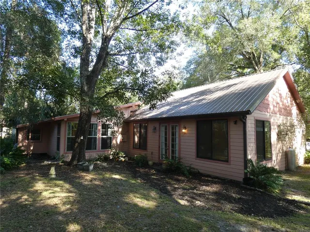 a view of a trees in a yard