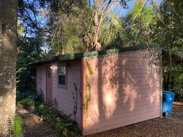 a backyard of a house with lots of green space