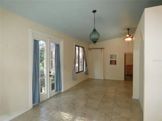 a view of a room with windows