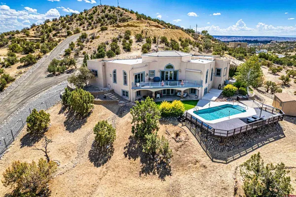 a building with trees in the background
