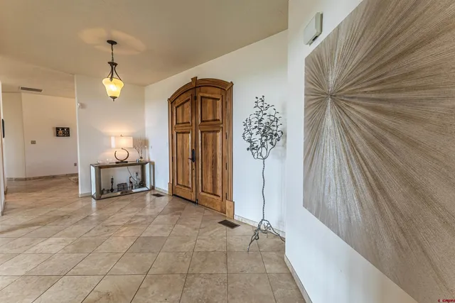 a view of a hallway view with staircase