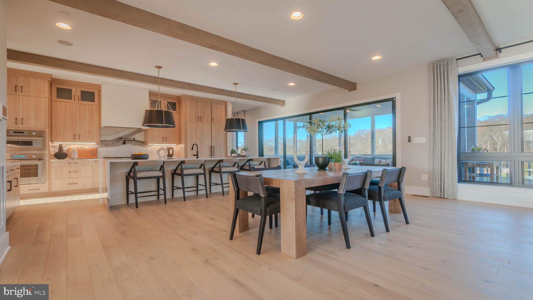 3 Springbury Drive Purcellville, VA 20132 - Photo 2 of 4 a view of a dining room with furniture and wooden floor