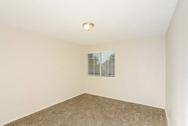 a view of a blue wall with windows