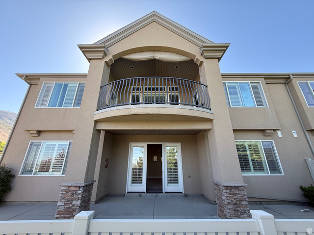 1562 Fairway Ridge Road Draper, UT 84020 - Photo 54 of 60 Stucco exterior featuring a second-story balcony with decorative iron railings