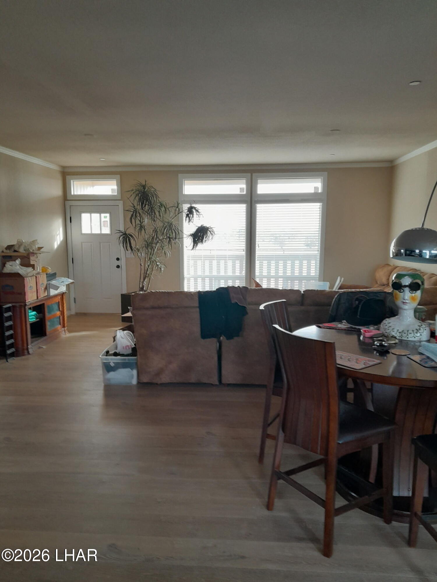 42159 Harms Way Salome, AZ 85348 - Photo 10 of 16 a living room with furniture a large window and a table